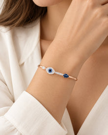 Blue Crystal Evil Eye Charm Bracelet – Rose Gold Tone – model wearing view