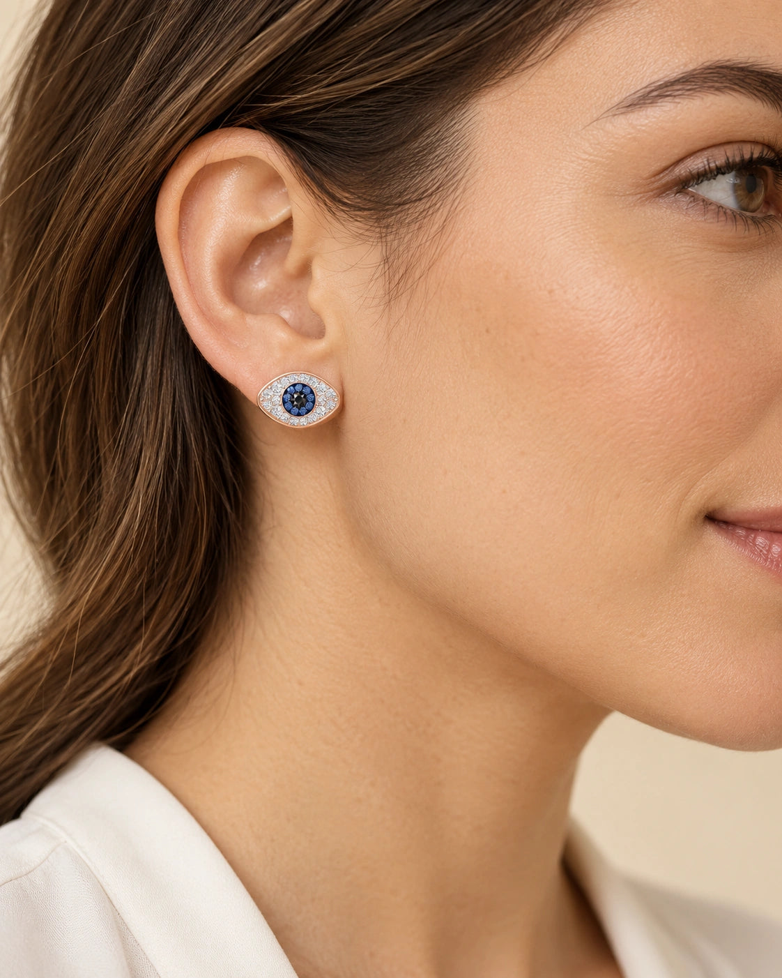 Blue Evil Eye Stud Earrings – Rose Gold Tone – model wearing view