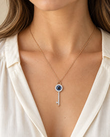 Blue Evil Eye Key Pendant Necklace – Rose Gold Tone – model wearing view