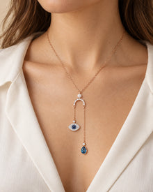Blue Evil Eye & Teardrop Lariat Necklace – Rose Gold Tone – model wearing view