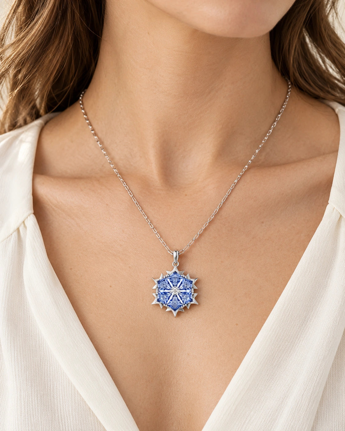 Blue Crystal Snowflake Pendant Necklace in Silver Tone – model wearing view