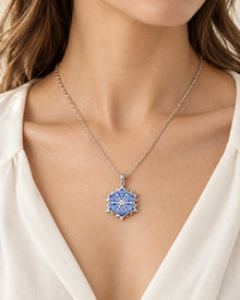 Blue Crystal Snowflake Pendant Necklace in Silver Tone – model wearing view