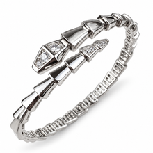 Serpent Aura silver-tone head-and-tail-only zircon-set snake wrap bangle on white background