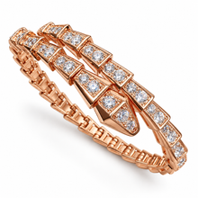 Serpent Aura rose-gold-tone fully zircon-set snake wrap bangle on white background
