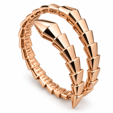 Serpent Aura rose-gold-tone polished stone-free snake wrap bangle on white background